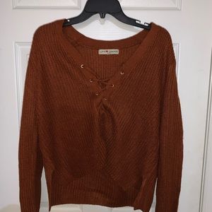 Never been worn burnt orange laced sweater!